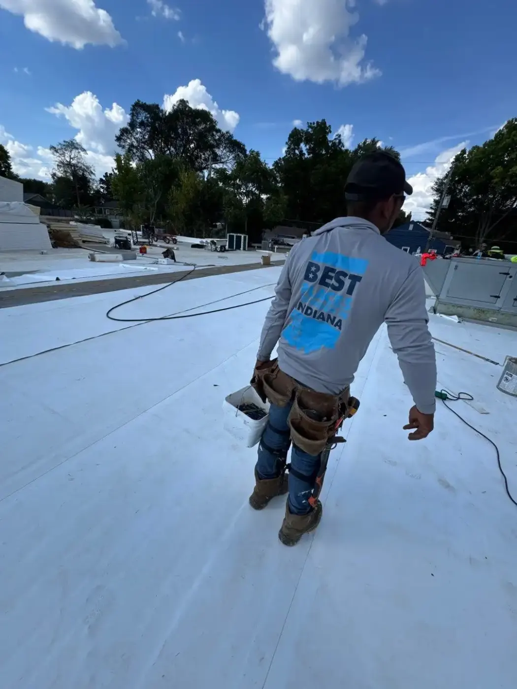 Tarping and dry-in on a Meridian Hills commercial roof